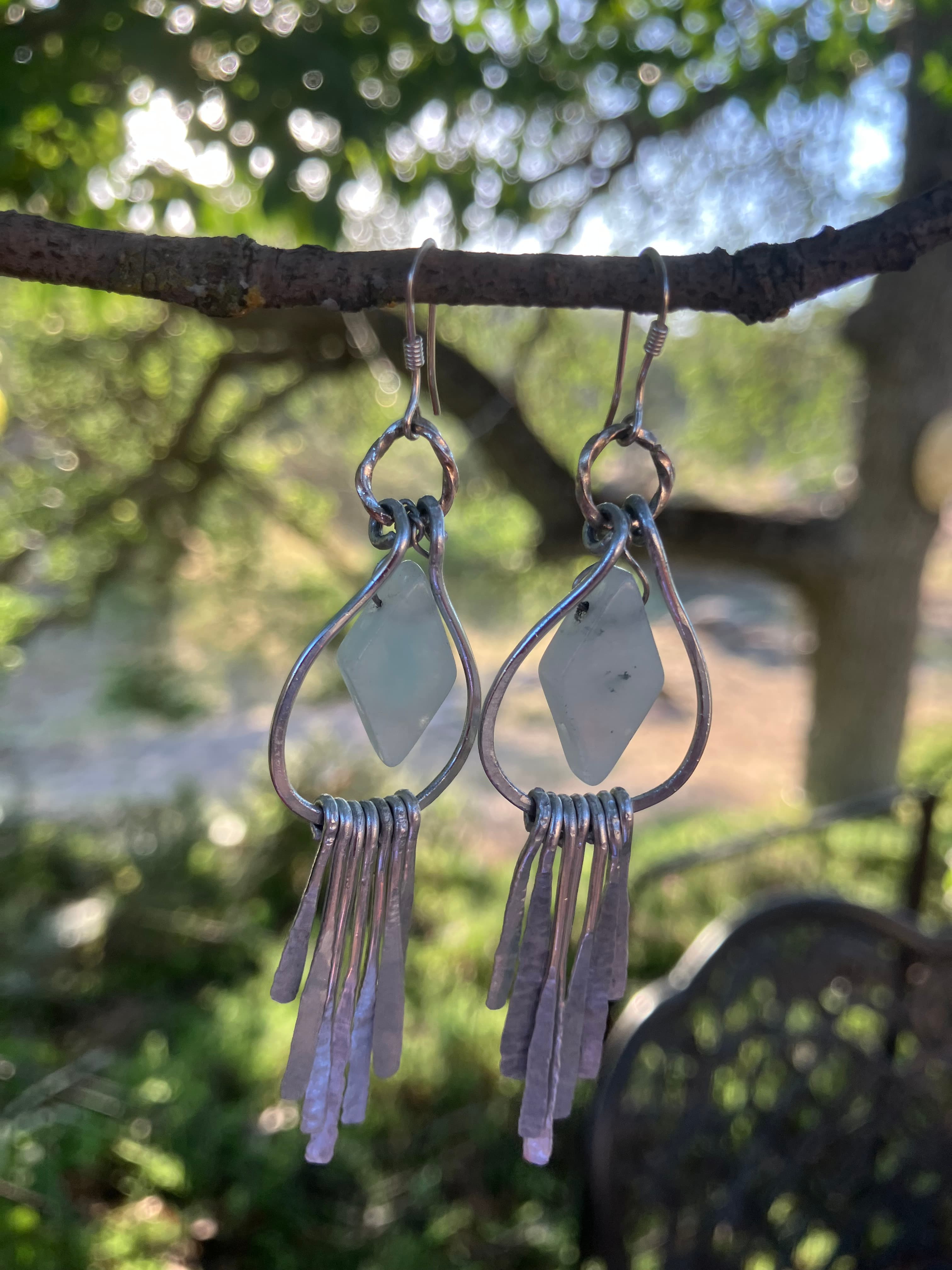 #8JG Diamond shaped moonstone. 7 paddle