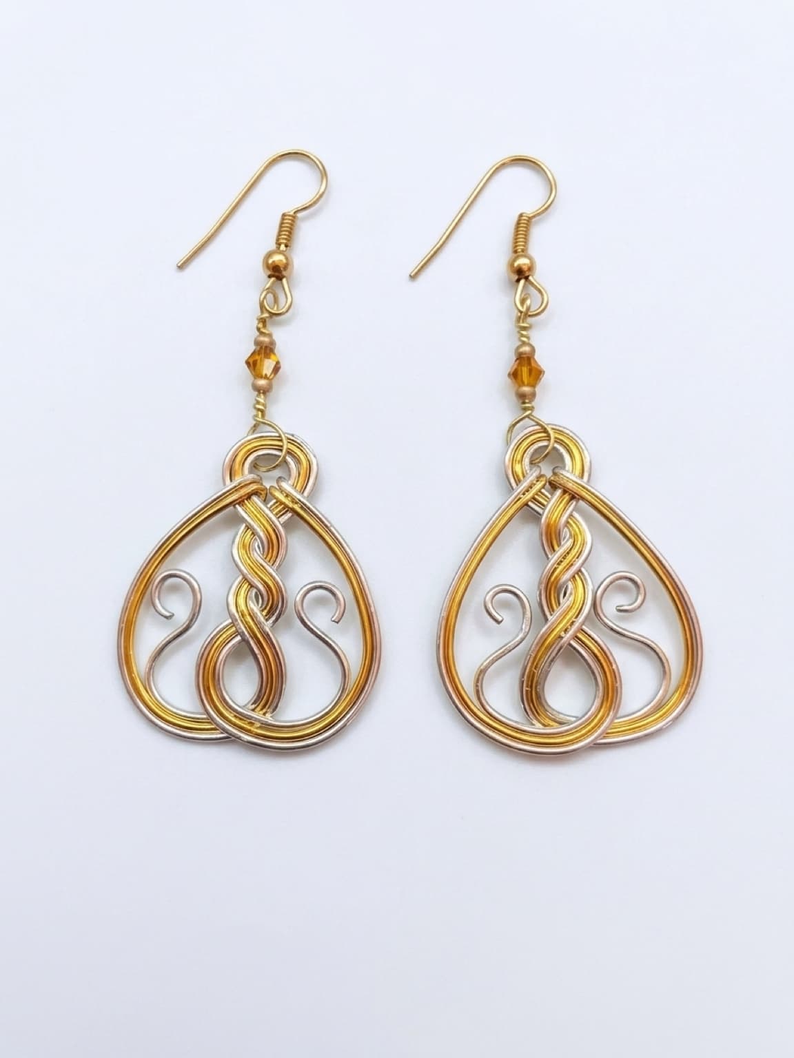 #7JG Silver and gold twisted horseshoe earrings