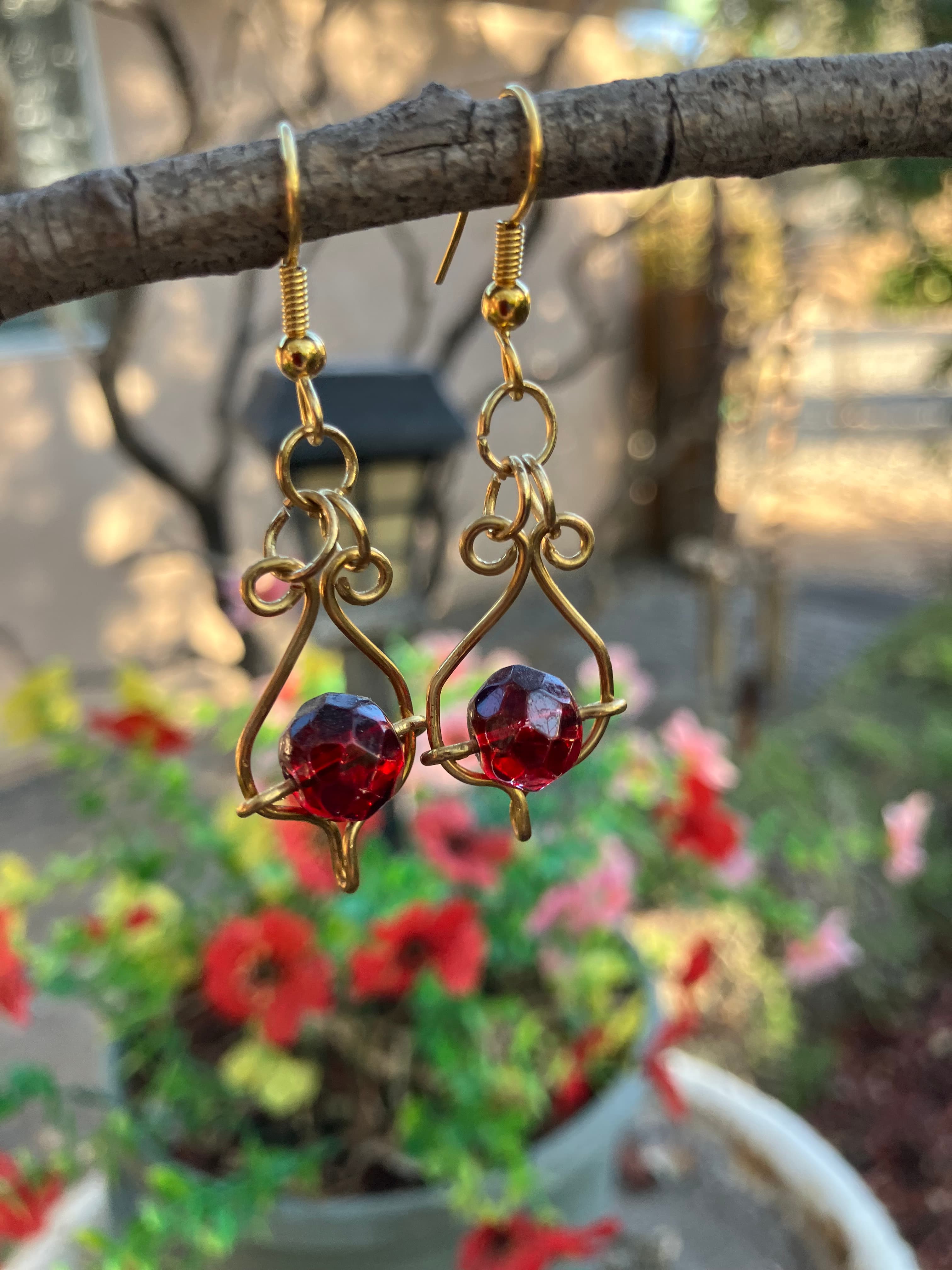 #22JG Brass teardrop w/ red bead